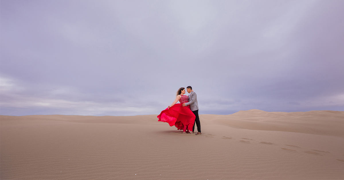engagement picture in the sand